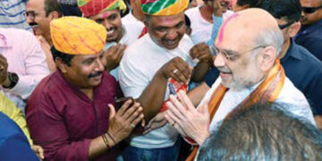 Union Home Minister Amit Shah with party workers in Gandhinagar
