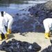 Oil spill off Singapore spreads