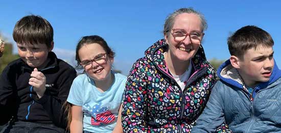 Oran (R) with his mum, brother and sister.